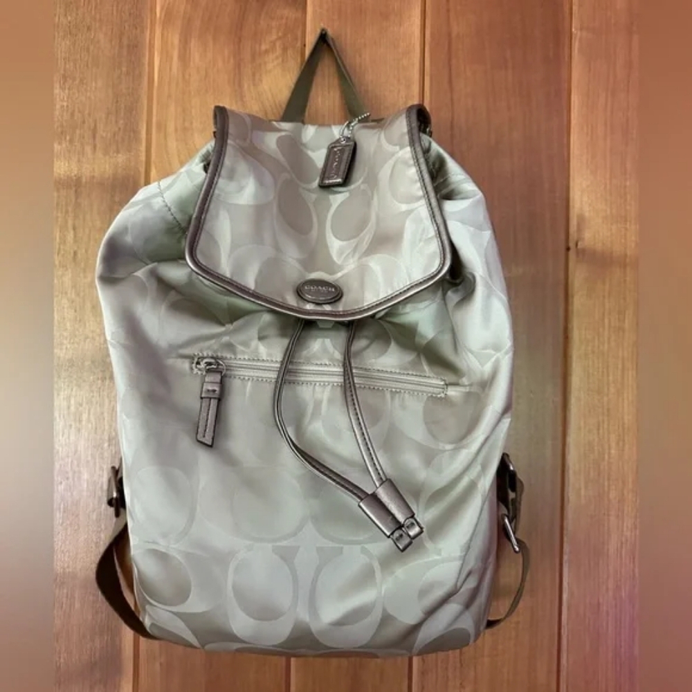 COACH Beige/Metallic Signature Nylon and Leather Backpack. Lightweight